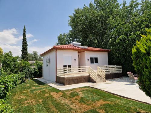 Happy by the Sea in Nea Kallikrateia, Greece