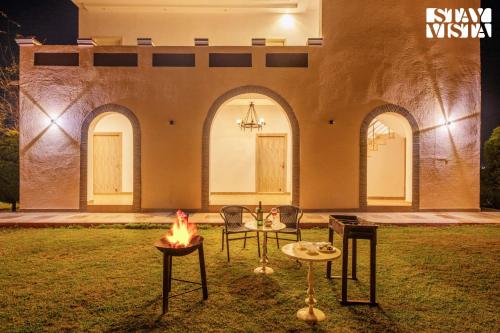 StayVista’s Lake Pearl Serenity Riverside Mountain View Villa with Jacuzzi Sprawling Lawn & Terrace