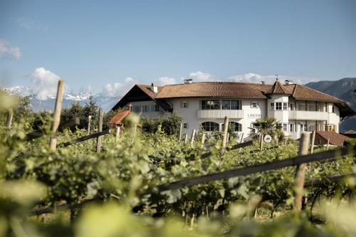 Lingers Suites & Residence — 4-Star Luxury Hotel in Cornaiano, Italy