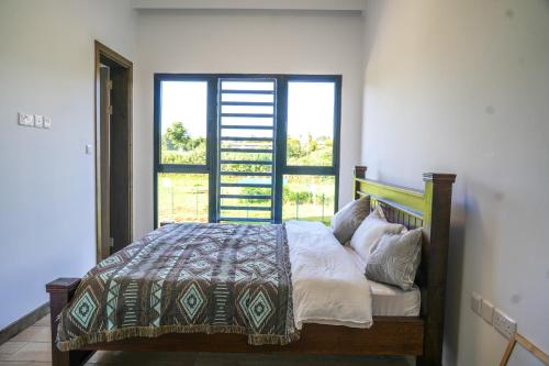 Riverbank One Bedroom Apartment Swimming pool gym workspace DB Space Living