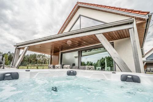 Ant House Complex Luksusowe domy SPA — 4-Star Luxury Hotel in Ryn, Poland