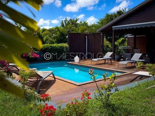 PROMO Villa bois & Prestige 3CH à 5 min de la plage des raisins clairs — 4-Star Luxury Hotel in Saint-Francois, Guadeloupe