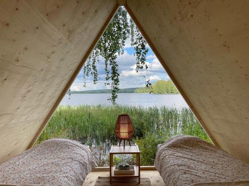 Triangeli glampingmökki in Haemeenlinna, Finland