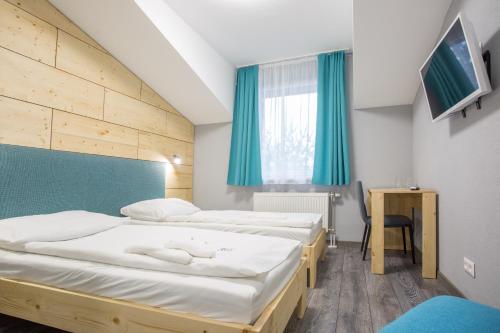 Penzión Squash - carbon neutral hotel in Liptovsky Mikulas