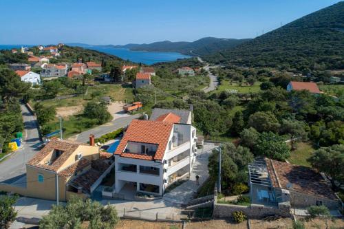 Apartments with parking space Sveti Jakov Losinj 24153 — 4-Star Luxury Hotel in Mali Losinj, Croatia