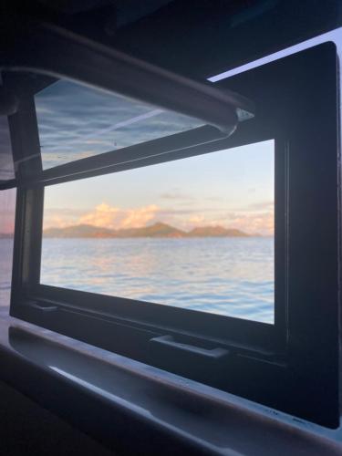 Island Hopping Sailing Catamaran in Unknown City, Seychelles