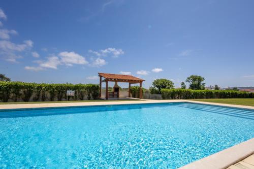 Carmen Vista para o jardim — 4-Star Luxury Hotel in Sao Martinho Do Porto, Portugal