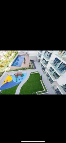 Great Studio in Jvc with Pool - carbon neutral hotel in Dubai