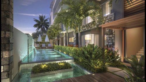 Luxury Westwood Apartment pool — 4-Star Luxury Hotel in Flic En Flac, Mauritius