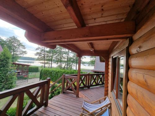 Domek nad jeziorem nr 3 Ryn Mazury in Ryn, Poland