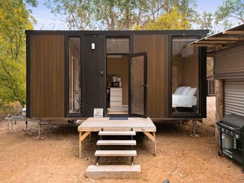 The Verge of Nowhere Oak by Tiny Away - carbon neutral hotel in Unknown City