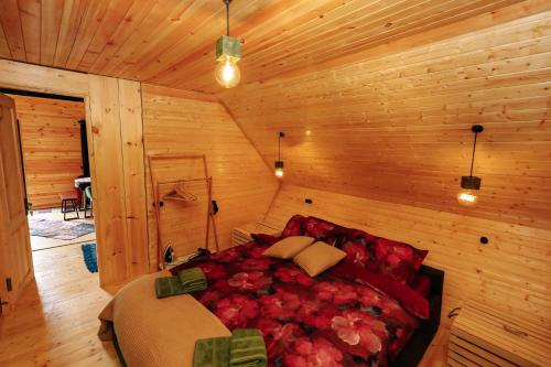 Wooden cottage green house in Bakuriani