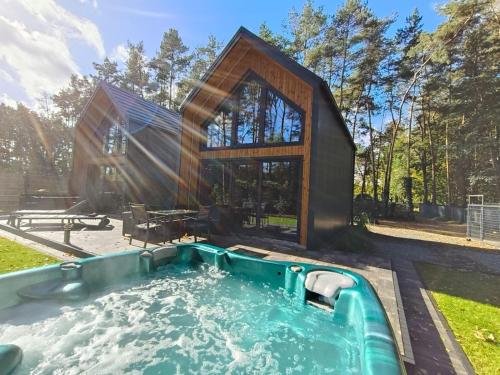 Holiday Hossa House 391 całoroczne domy z Jacuzzi Sława — 4-Star Luxury Hotel in Slawa, Poland