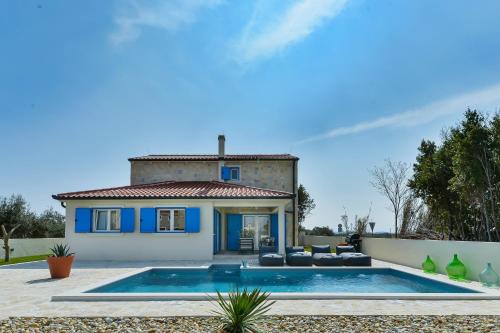 Beautiful new villa with a pool near sandy beach large garden by Traveler tourist agency Krk ID 2384 — 4-Star Luxury Hotel in Privlaka, Croatia