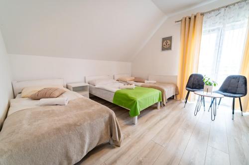 Pokoje na Żurawiej 10 in Mikolajki, Poland