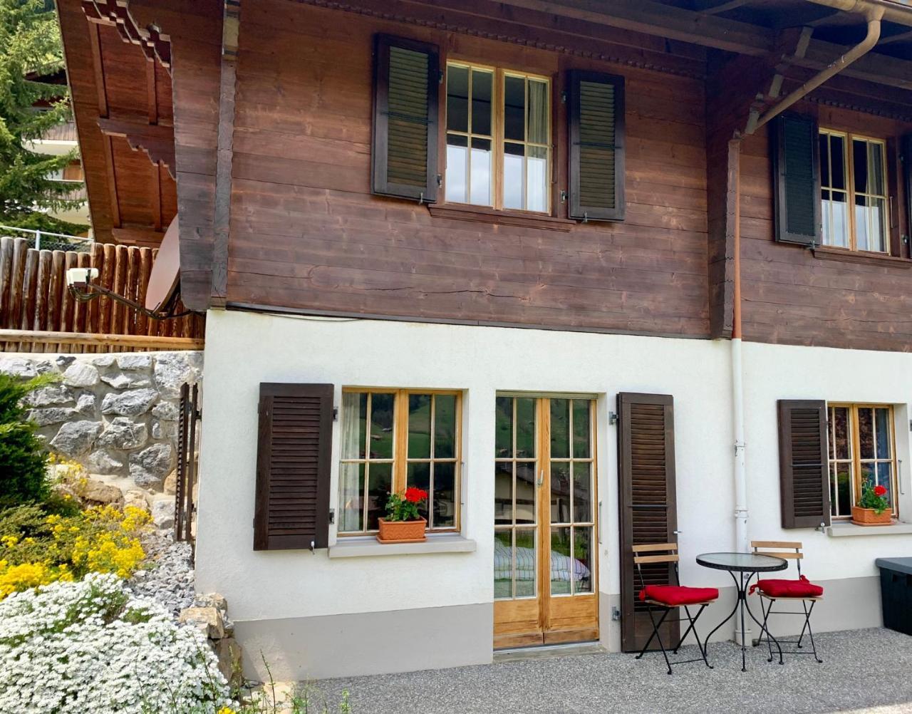 One Bedroom with mountain and garden view ground floor of Chalet Solaria — 4-Star Luxury Hotel in Zweisimmen, Switzerland