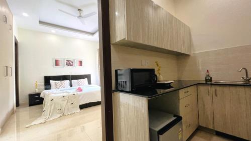 BluO Studio DLF CyberCity Kitchen Balcony Lift