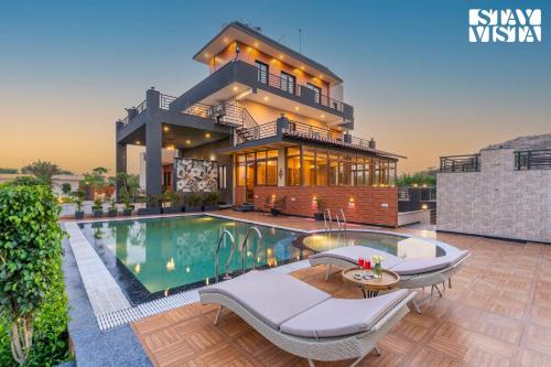 StayVista's Shivoham Farms Mountain View Villa with Outdoor Pool Lawn and Terrace — 4-Star Luxury Hotel in New Delhi, India