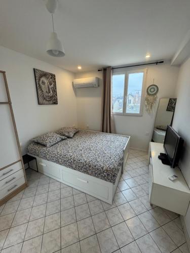 Studio Cosy Paris la Defense Arena — hotel in Houilles