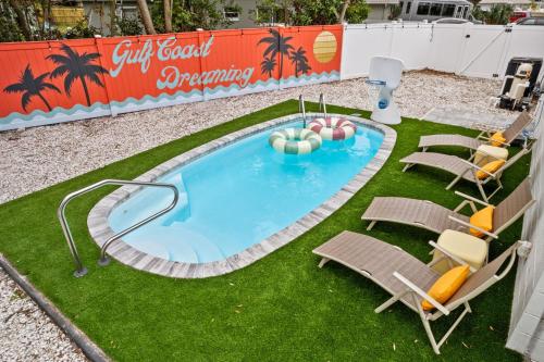 Resort Style Backyard Pool Sport Court Putt Putt in Seminole, United States