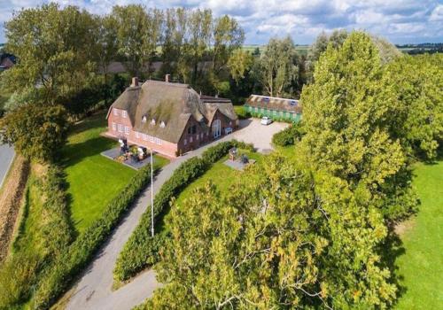 Haubarg Ossenhoff Haubarg Ossenhoff Appartement Gesindestuv — 4-Star Luxury Hotel in Tating, Germany