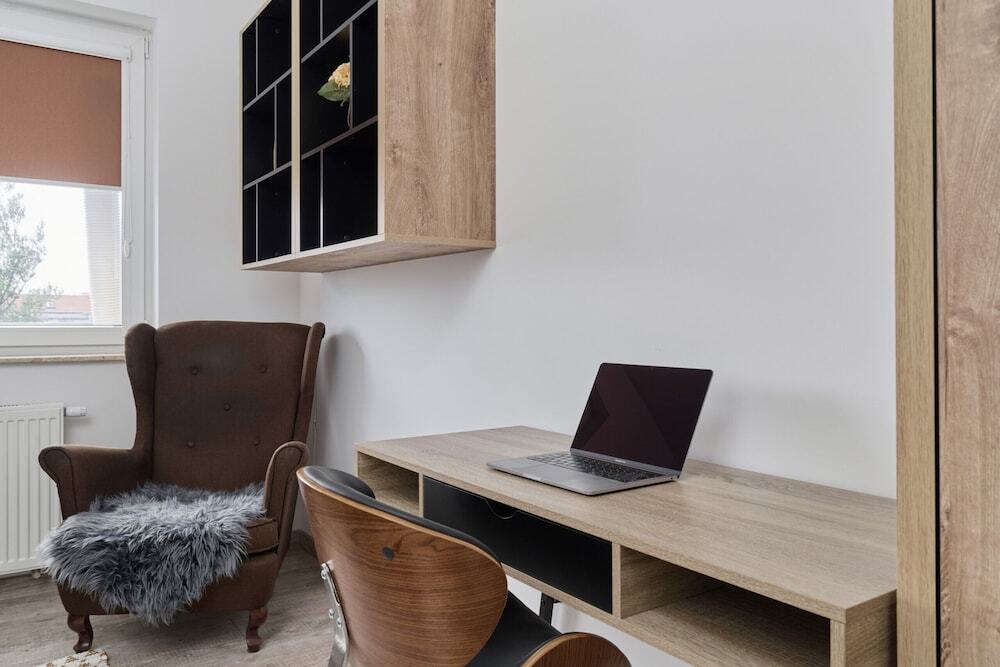 Spacious Apartment suitable for Remote Work with Balcony & Parking by Noclegi Renters — 4-Star Luxury Hotel in Wroclaw, Poland