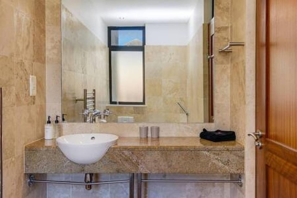 Secure Camps Bay Apartment w Pool Views Bali C