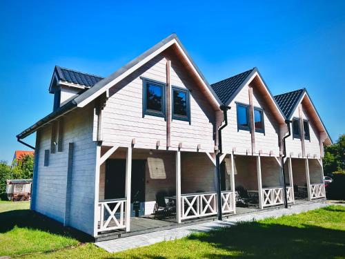 TUKAN Sianożęty Domek drewniany in Ustronie Morskie, Poland