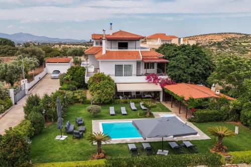 Olive Grove Villa — 4-Star Luxury Hotel in Koropi, Greece