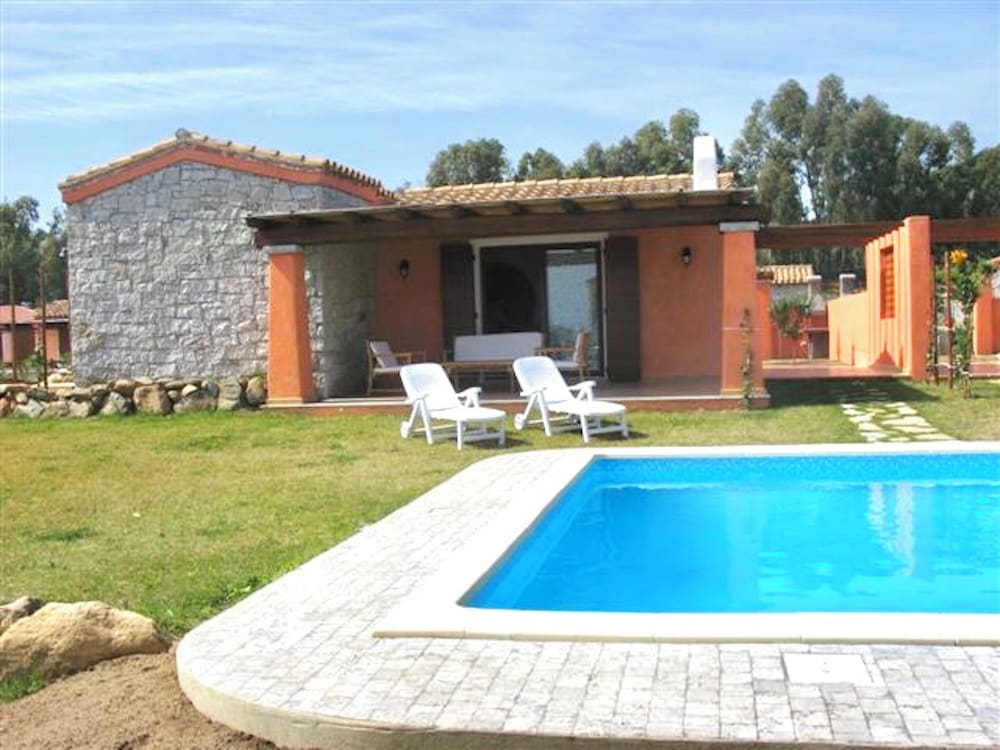 Villas with common or private pool in Costa Rei — 4-Star Luxury Hotel in Muravera, Italy
