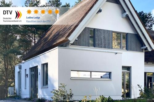 Ferienhaus Lodino Lodge mit Sauna und Kamin — 5-Star Luxury Hotel in Loddin, Germany