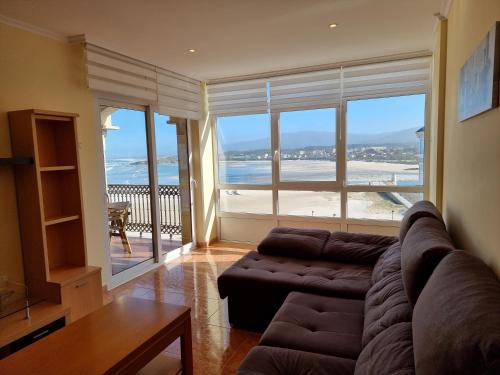 Dúplex en 1ª línea de playa — 4-Star Luxury Hotel in Foz, Spain