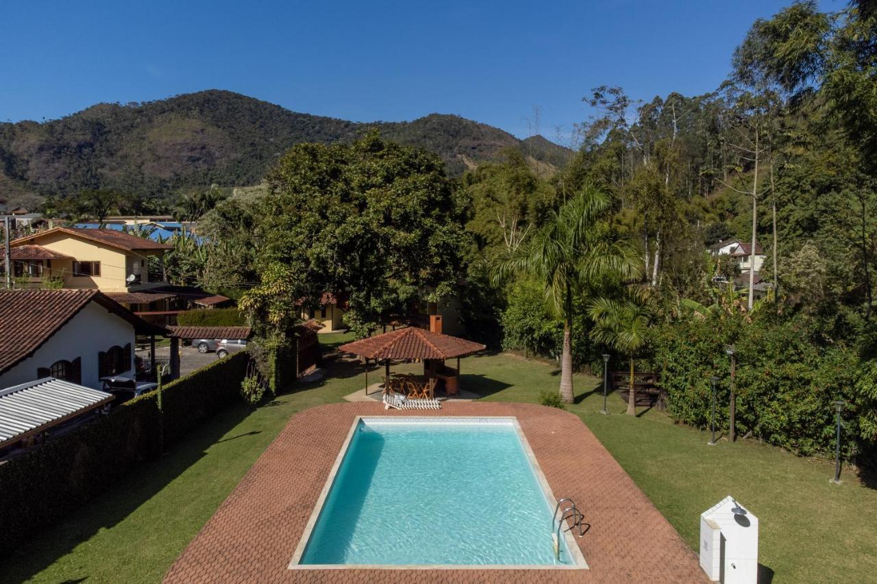 Casa Di Maria 4 Quartos a 500m Centro Sauna Piscina Fogão a Lenha Churrasqueira ACESSO PRIVATIVO AO AO RIO Ideal para famílias — 4-Star Luxury Hotel in Nova Friburgo, Brasil