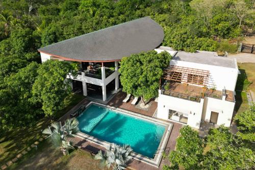 The Leaf by StayVista An enchanting escape offering a pool terrace lush lawn contemporary interiors and indoor games in Unknown City, India