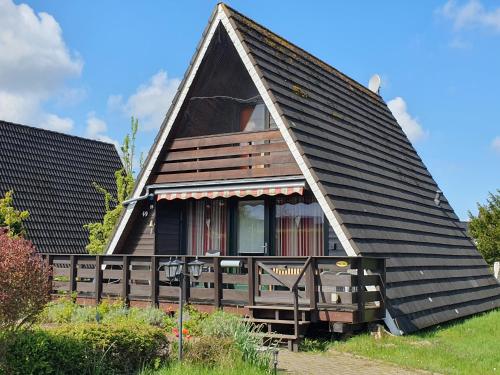 Nurdachhaus Ein Haus Am Deich — 4-Star Luxury Hotel in Butjadingen, Germany