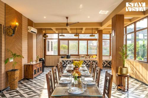 StayVista’s Shivoham Farms Mountain View Villa with Outdoor Pool Lawn and Terrace