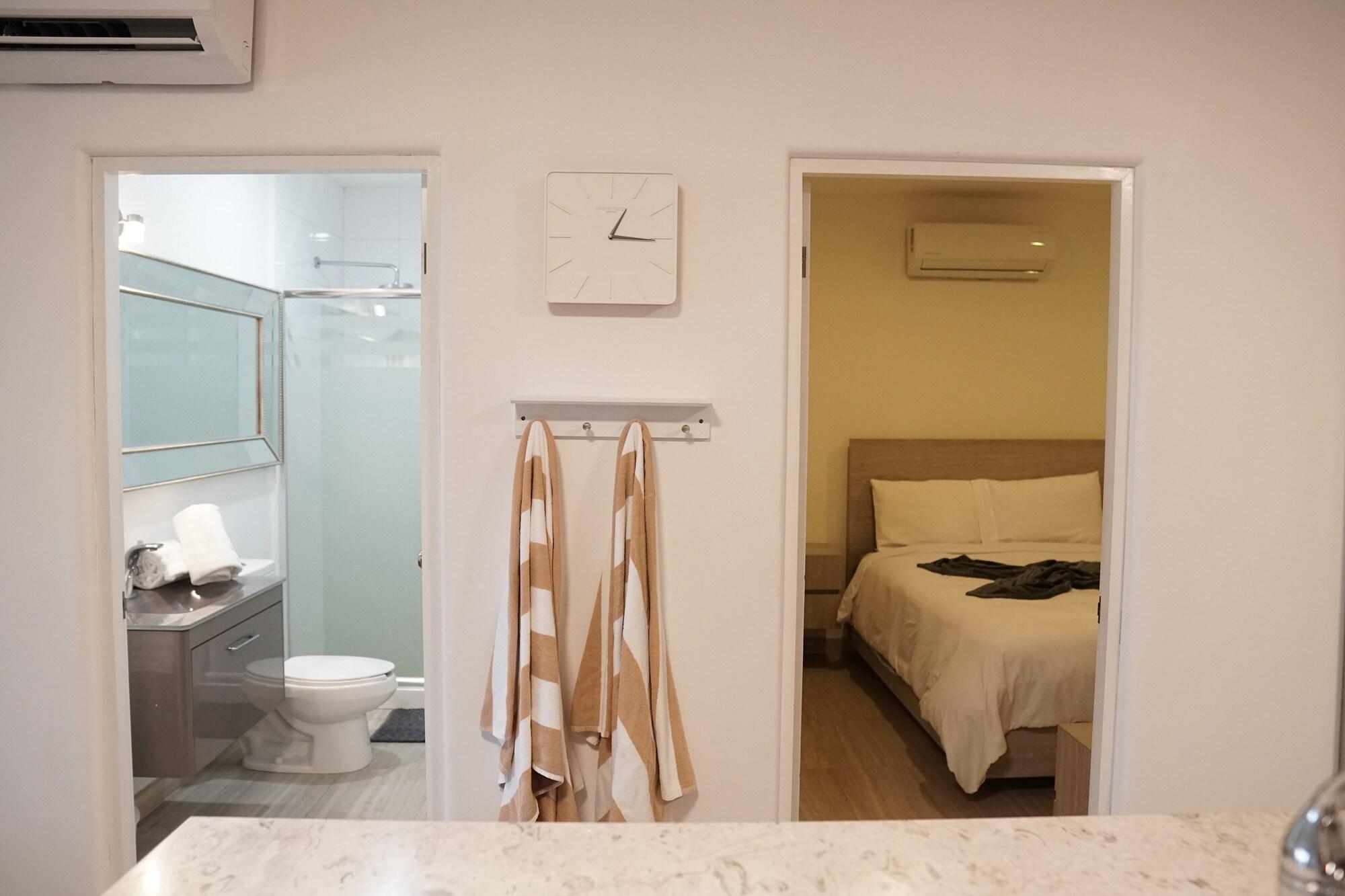 Bahia del Tezal 103b 1BR Modern condo big rooftop pool walk to beach through Riu hotel in Cabo San Lucas, Mexico