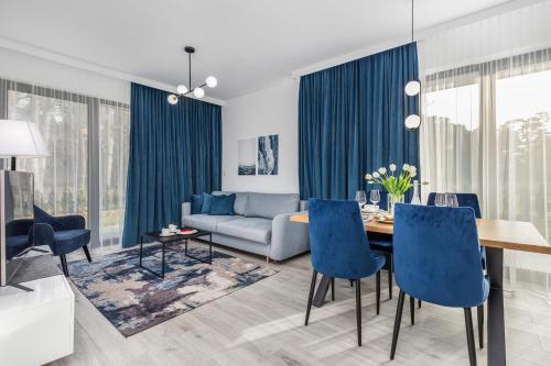 Rezydencja Niechorze Nowoczesny Apartament Parking & Taras z Ogrodem by Noclegi Renters — 4-Star Luxury Hotel in Rewal, Poland