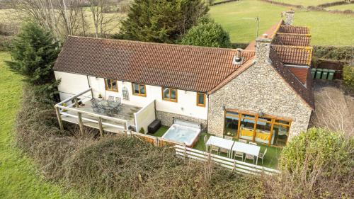 The West Barn near Bath sleeps 24 and 2 hot tubs