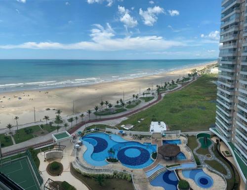 Resort Encantador pe na areia in Praia Grande, Brasil