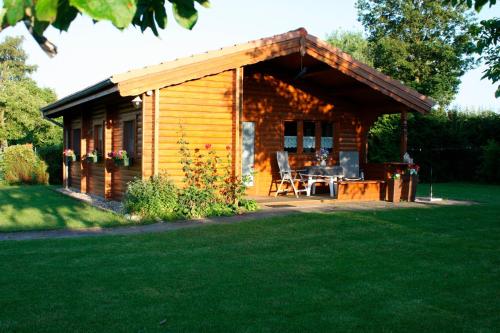 Blockhaus Thegen - carbon neutral hotel in Unknown City