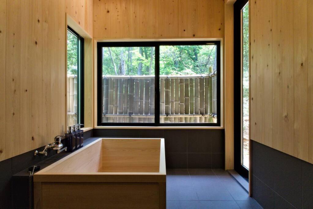 Noto cottage Hinoki no ie Onsen in a cypress bathtub — 4-Star Luxury Hotel in Ishigaki, Japan
