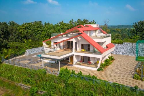 StayVista's Amorist Villa Amidst Greenery with Terrace Kids Zone Snooker Table Turf — 5-Star Luxury Hotel in Karjat, India