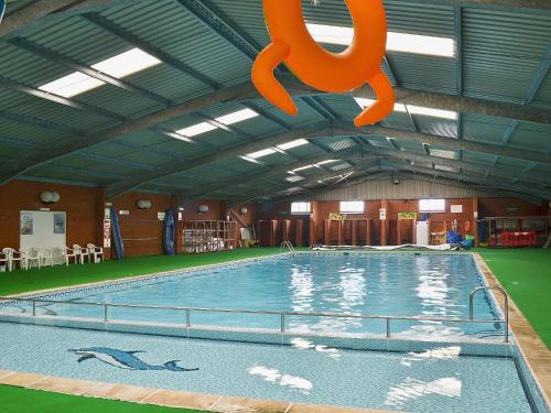 Sandy Den - carbon neutral hotel in Unknown City