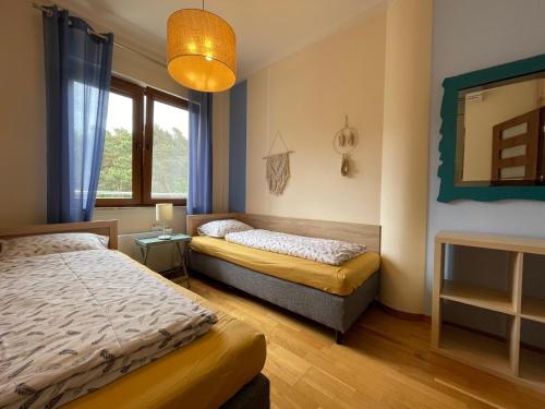 Klimatyzowany apartament przy plaży 2 sypialnie basen garaż Villa 4 Pory Roku — 4-Star Luxury Hotel in Jastrzebia Gora, Poland