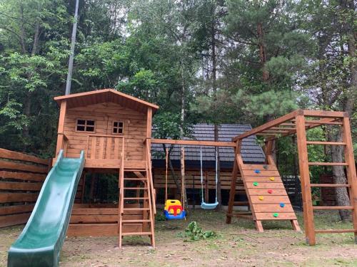 Domy Leśne Szumy Na Roztoczu Jacuzzi Sauna Spa in Zwierzyniec, Poland