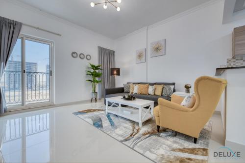 Sunny 1BR at Canal Residences West Dubai Sports City by Deluxe Holiday Homes — 4-Star Luxury Hotel in Dubai, United Arab Emirates