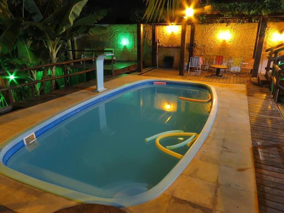 Piscina Sinuca e quartos com Ar condicionado Experiencia deliciosa em familia ou amigos in Ararangua, Brasil