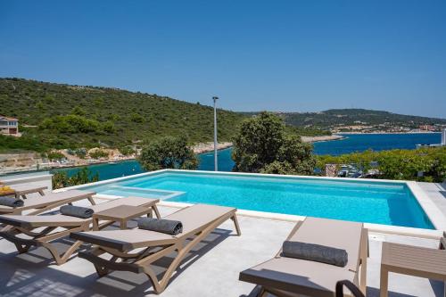 Beachfront Villa Larisa with Whirlpool Media room — 4-Star Luxury Hotel in Rogoznica, Croatia