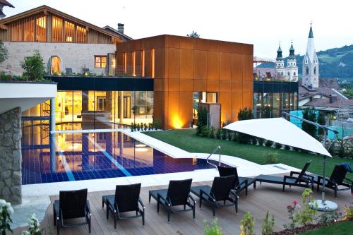 Hotel Grüner Baum - carbon neutral hotel in Bressanone